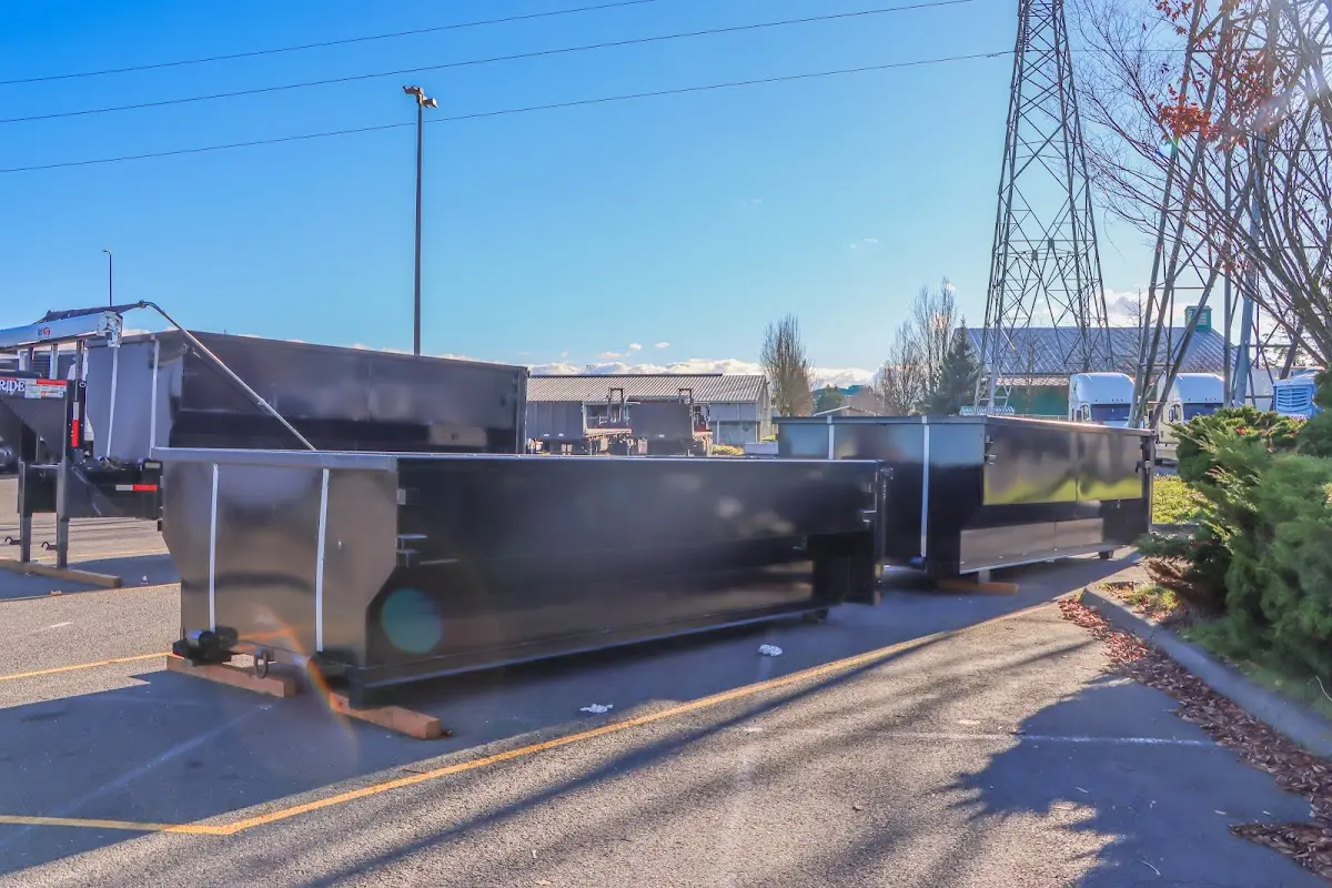 Roll-off dumpster ready for waste disposal at job site for Construction Dumpster Rental in Douglas